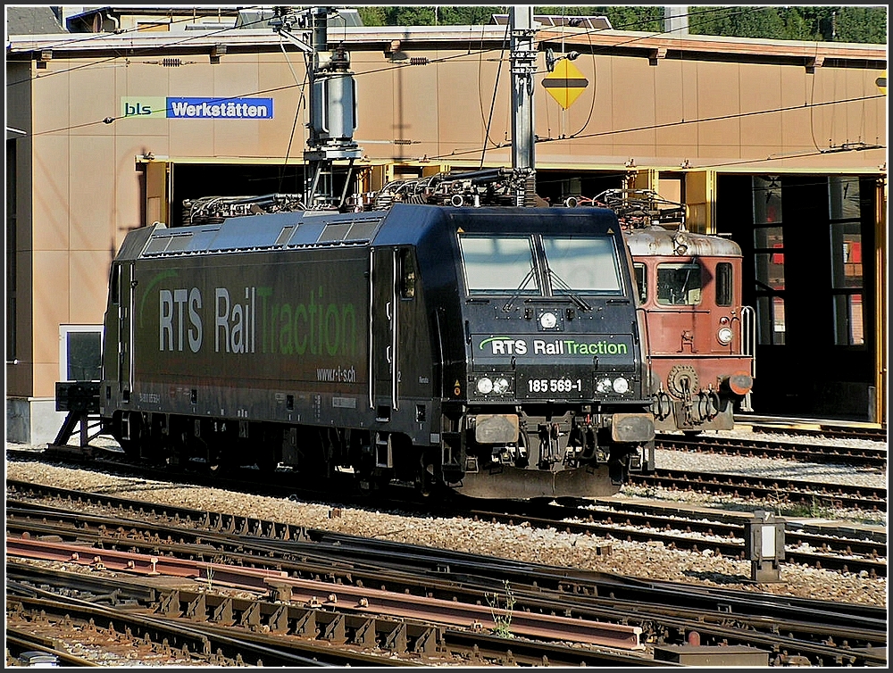 . RTS 185 569-1 and BLS Ae 8/8 taken in Brig on August 6th, 2007.