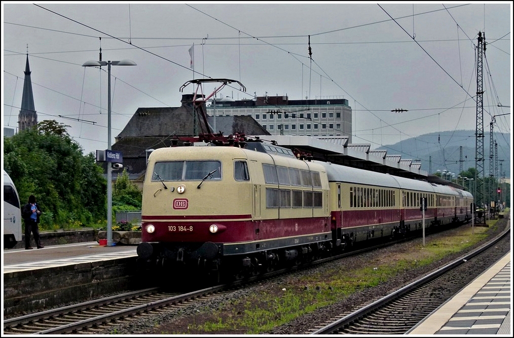 103 184-8 with Rheingold wagons is leaving the main station of Koblenz on June 25th, 2011.