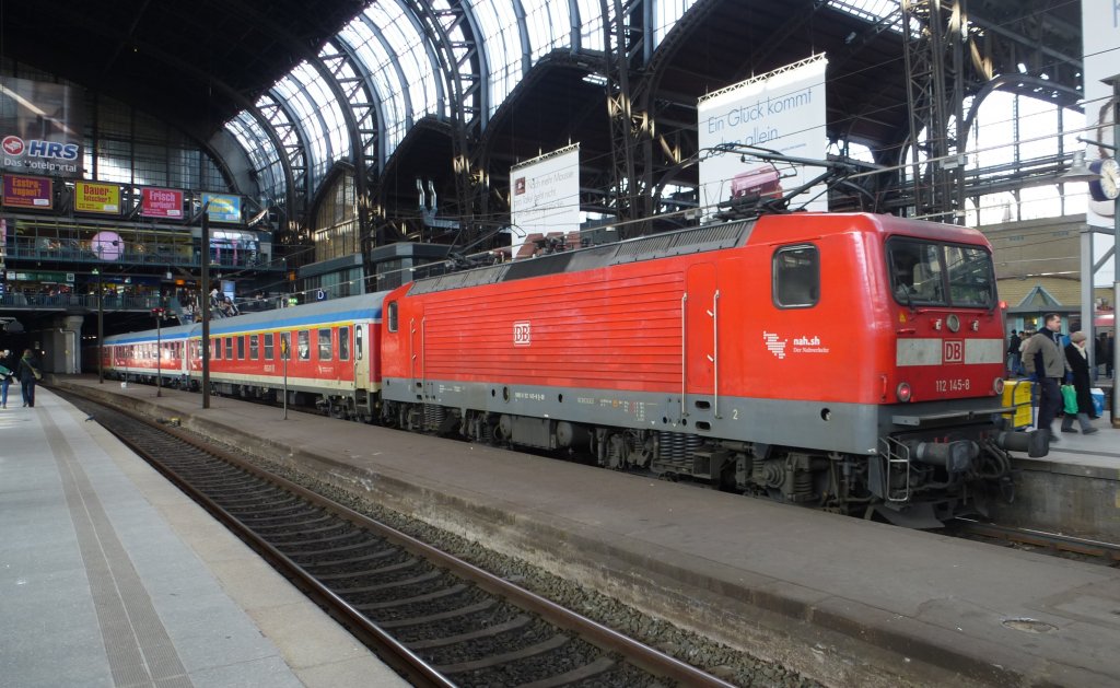 112 145-8 is standing in Hamburg main station, April 4th 2013.