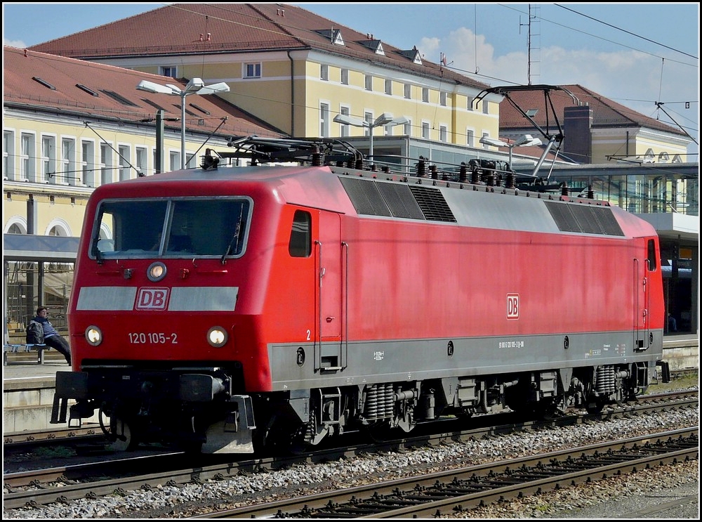 120 105-2 is running alone through the station of Regensburg on September 11th, 2010.