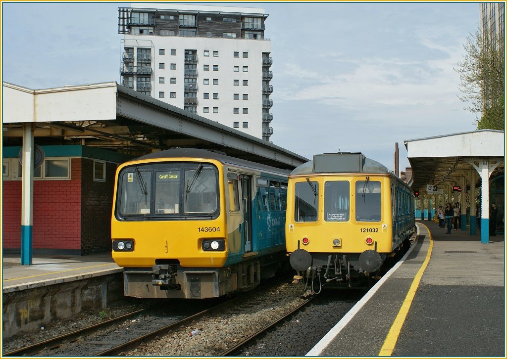 143 604 and 121 032 in The Cardiff Queen Street Station. 
28.04.2010