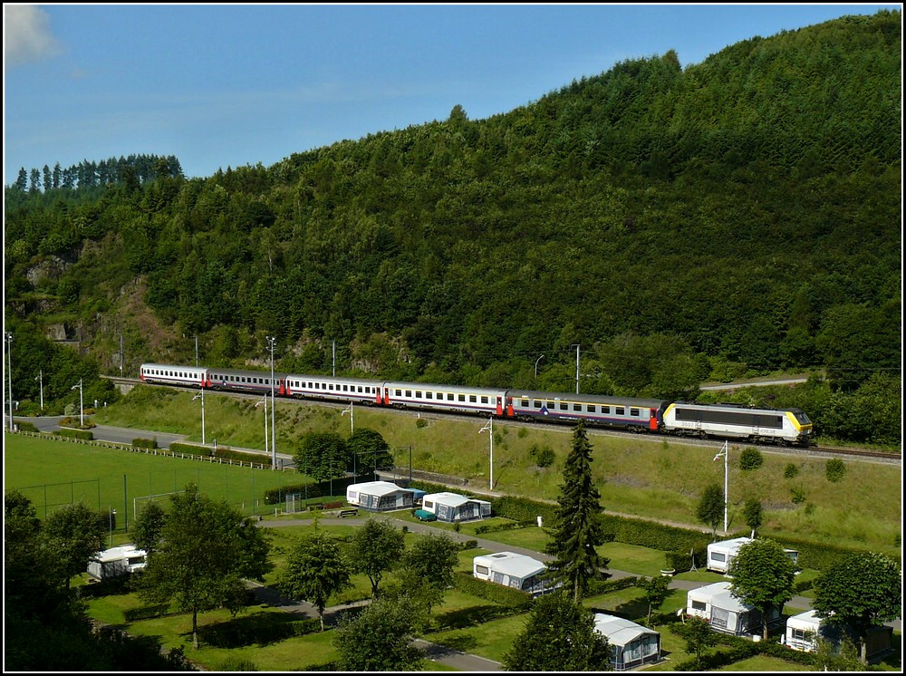 3007 is hauling the IR 110 Luxembourg City - Liers through Clervaux on June 23rd, 2009.