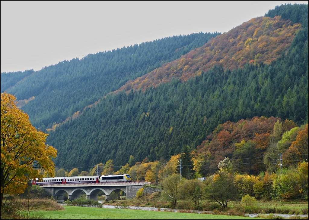 3017 is hauling the IR 112 Luxembourg City - Liers over the Sre bridge near Michelau on October 22nd, 2012.