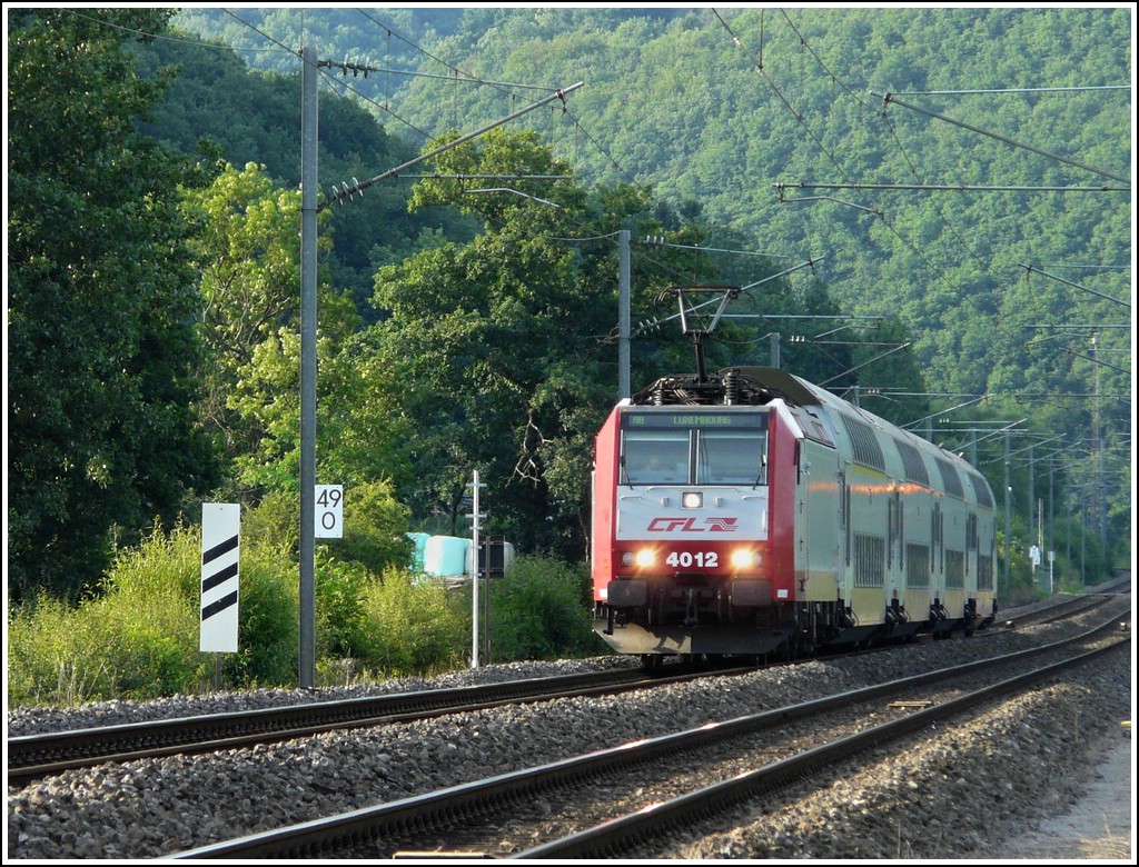 4012 is hauling the RB 3244 Wiltz - Luxembourg City through Erpeldange/Ettelbrck on July 10th, 2008.