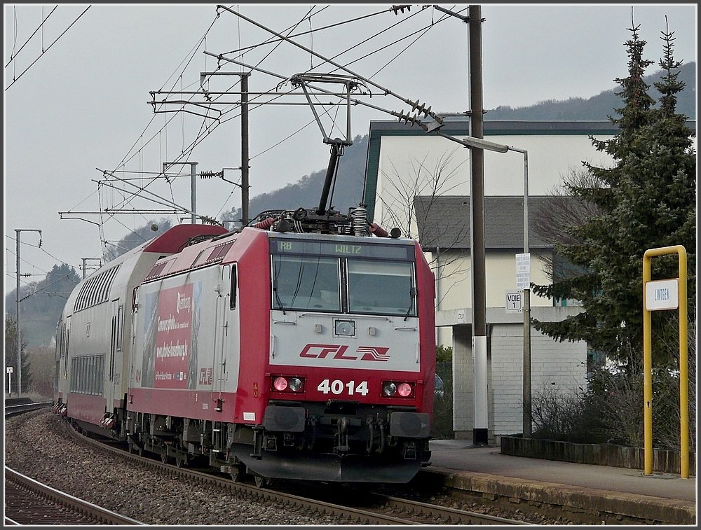 4014 is pushing its train out of the station of Lintgen on February 18th, 2010.