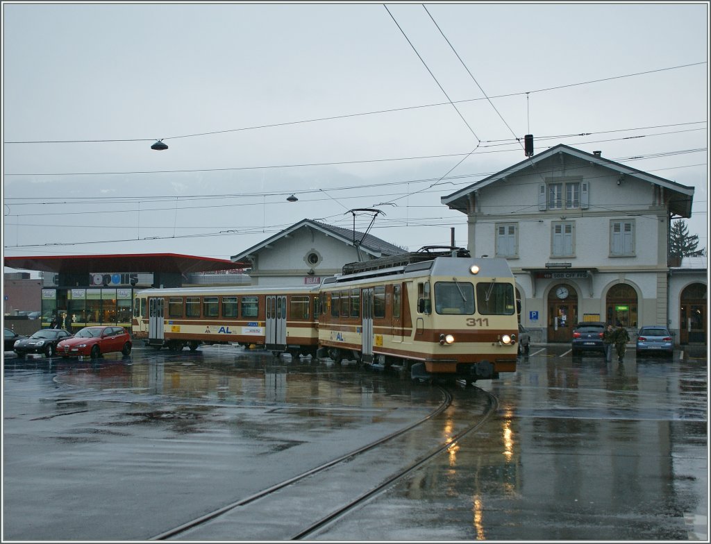 A A-L local train is leaving Aigle Station. 
19.03.2011