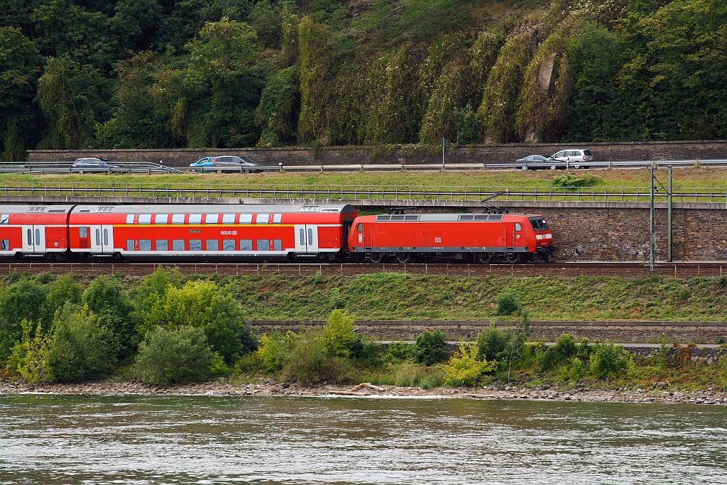 A German Class 146 with the RE 5 - Rhein-Express (Emmerrich -Cologne-Koblenz), on 11.08.2011,  runs at the left side of the Rhine upwards, across from Unkel, towards Koblenz Hbf.
