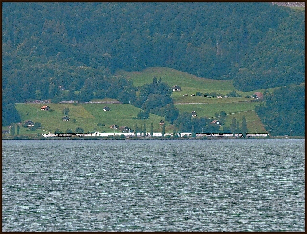 A ICE is running along the lake of Thun between Spiez and Interlaken on July 29th, 2008.