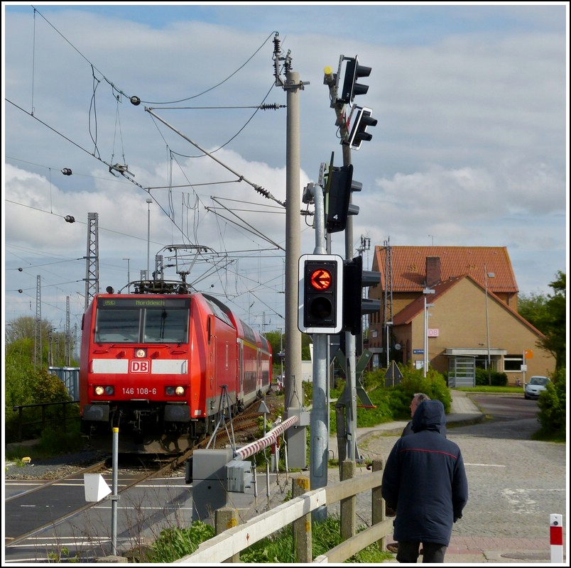 A local train from Hannover is arriving in Norddeich Mole on May 11th, 2012.