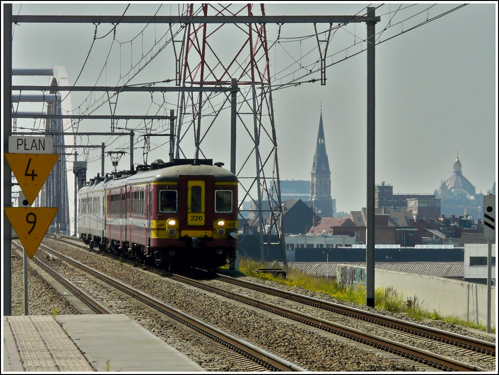 A local train is arriving at the station Antwerpen-Luchtbal on June 23rd, 2010.
