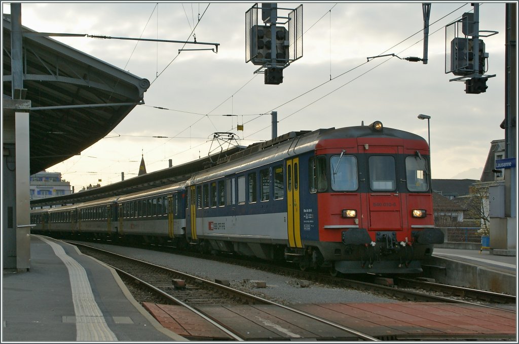 A RBe 540 with a Rush hour train from St-Maurice is arrived in Lausanne. 
10.03.2011