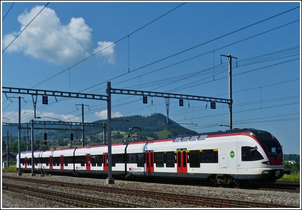 A SBB Flirt is arriving in Palzieux on May 28th, 2012.