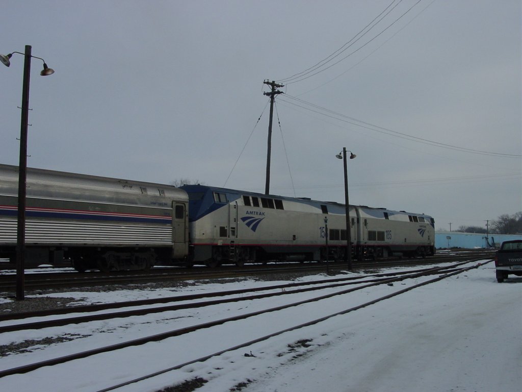 Amtrak 185 & 158 sit at the Burlington, Iowa depot as passengers load on 13 Dec 2005.