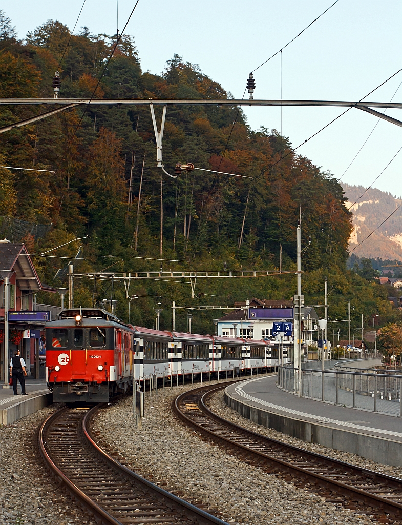 Baggage railcar De 110003-1 of the Zentralbahn with IR in the direction of Interlaken Ost. Here at the station in Brienz 30.09.2011.