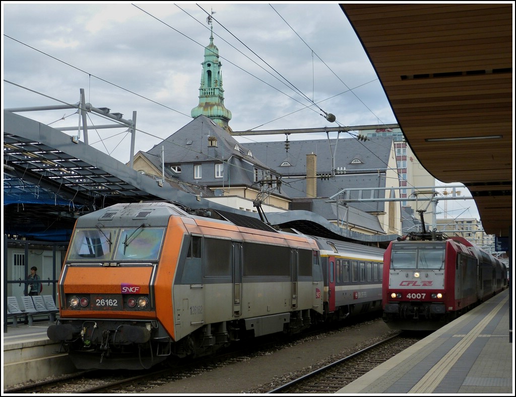 BB 26162 is hauling the IC 91  Vauban  out of the station of Luxembourg City on April 30th, 2012.