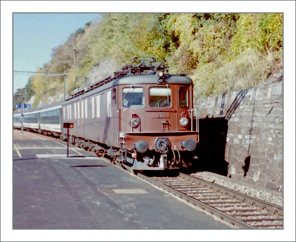 BLS Ae 8/8 271 with a fast train in Hohtenn. 
Mai 1995