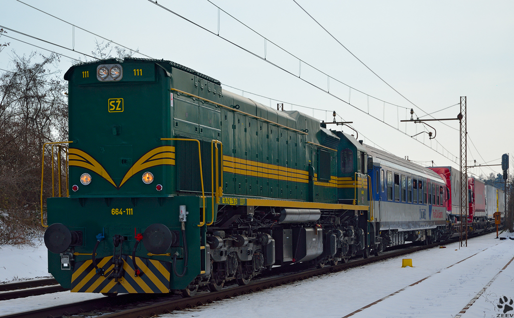 Diesel loc 664-111 pull ROLA train through Maribor-Tabor on the way to the north. /28.3.2013
