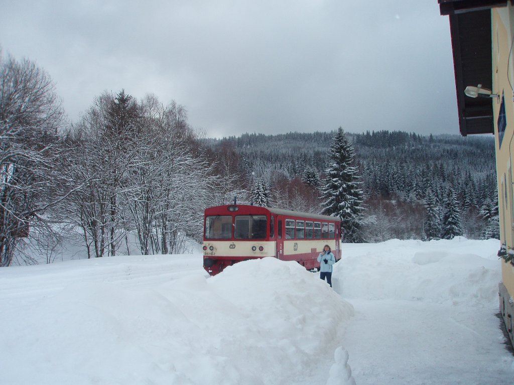 Diesel locomotive 810 for the local railway comes to station Kubova Hut 935m ASL at 24.1.2012.