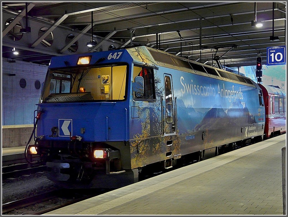 Ge 4/4 III 647 is waiting with its train at the station of Chur on December 22nd, 2009.