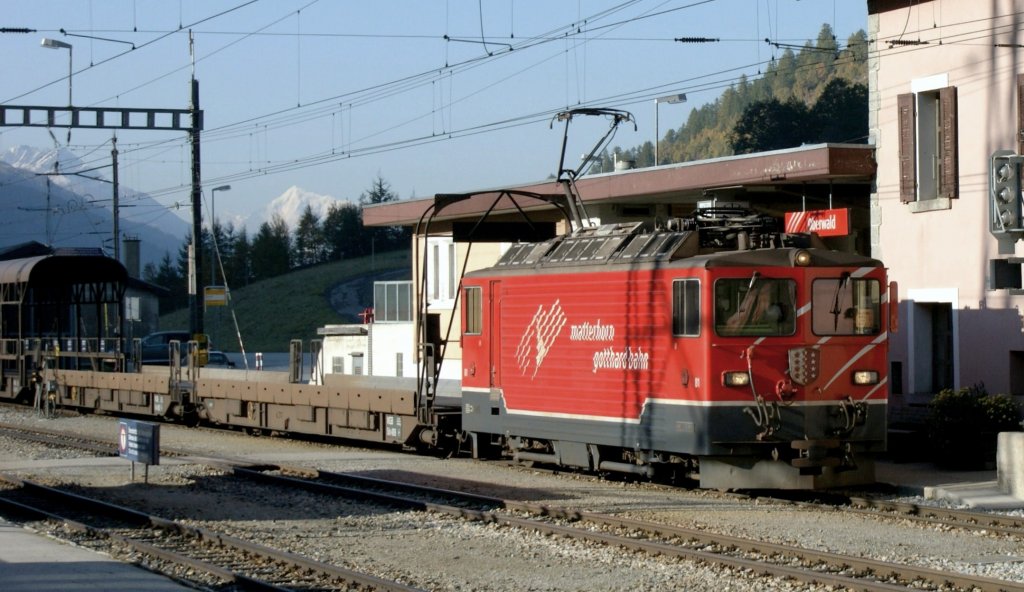 Ge 4/4 with a tunnel Auto-transport-shuttle in Oberwald.
10.10.2008
 