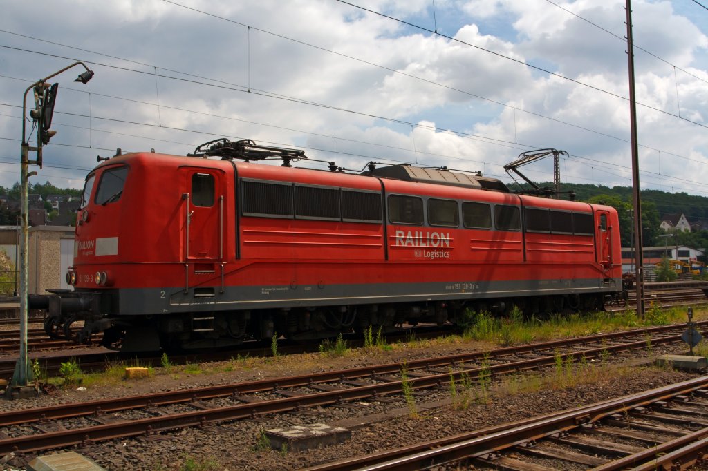 German electric locomotive 151 139-3 from the RAILION Logistics  parked at the 28/05/2011 in Kreuztal (Germany). The pantograph have just been moved out.