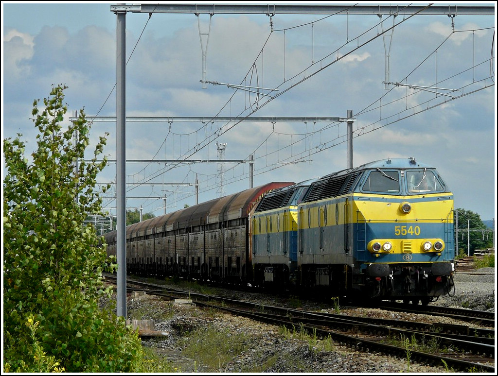 HLD 55 double header is hauling a goods train through the station of Montzen on July 12th, 2008.