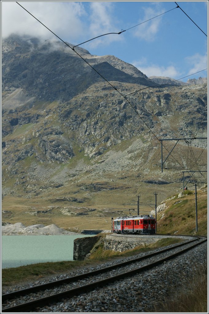 In a few time this Bernina Express will by on highest point of his Journey: Bernina Osoizia. 
10.09.2011
