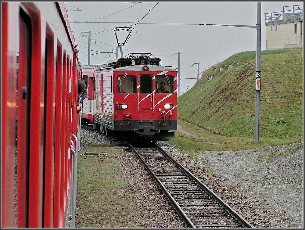 Meeting of two MGB local trains at Ntschen on August 7th, 2007.