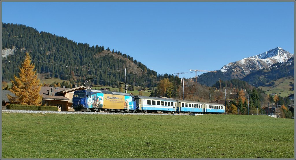 MOB Ge 4/4 with a Golden Pass local train by Gstaad. 
05.11.2010