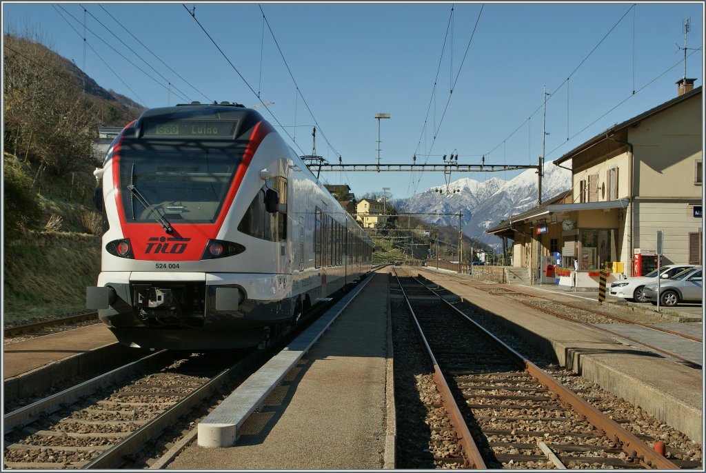 SBB / trenord Tilo RABe 524 004 (ETR 150) on the way to Luino by his stop in Magadino Vira. 
22.03.2013