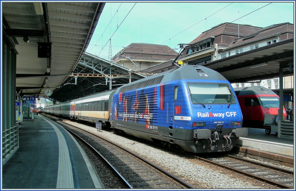 SBB RailAway Re 460 050-8 with an IR in Lausanne. 
13.07.2010