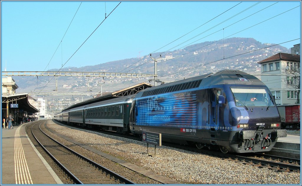 SBB Re 460 051-6 with an IR to Brig by the stop in Vevey. 
09.03.2011