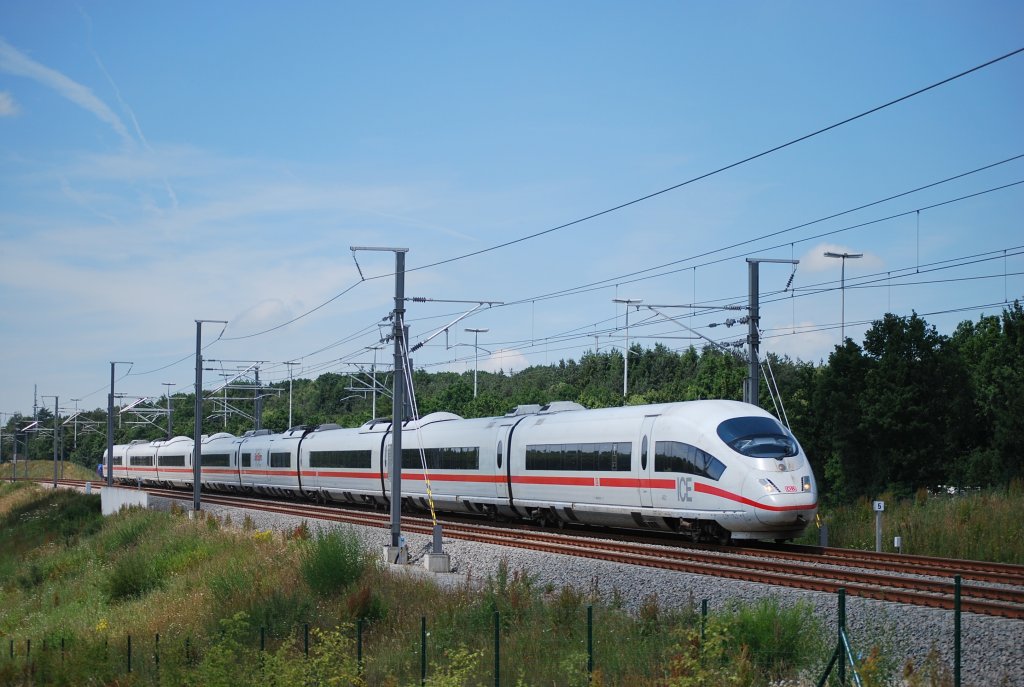 Some days after the inauguration of the new high speed track, a DB ICE is running through Grnhaut forest (B) towards Frankfurt-on-Main. June 2009