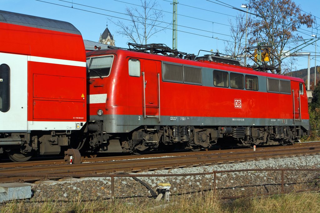 The 111010-5 pushes the RE 9 - Rhein-Sieg-Express (Siegen main station - Aachen main station), here briefly before entering the station Betzdorf / Sieg on 13.11.2011.