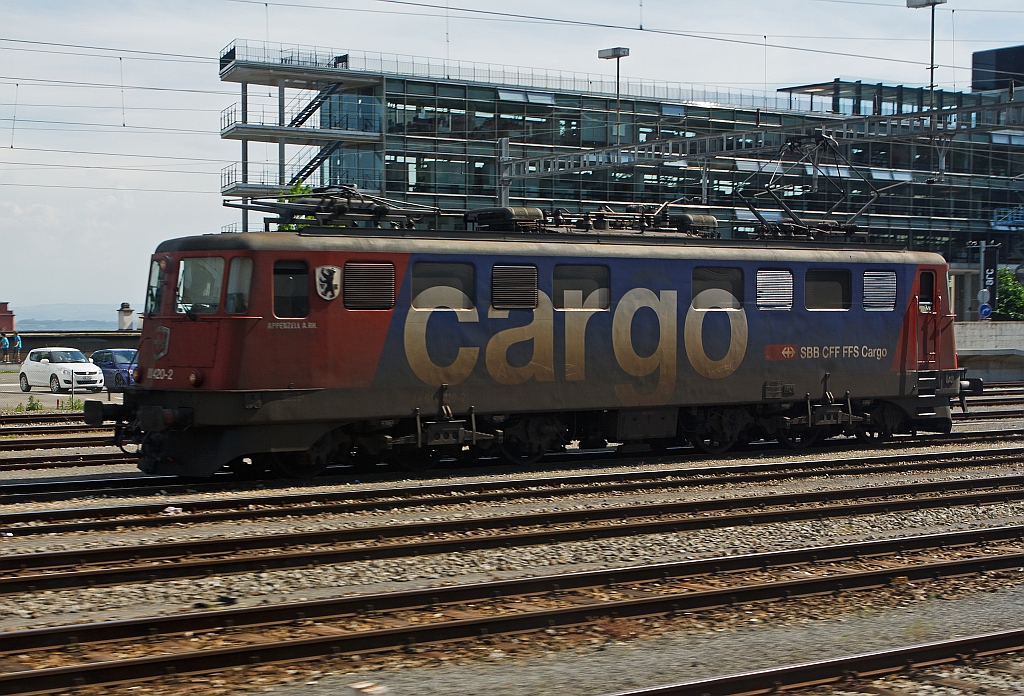 The Ae 610 420-2   A. Appenzell A. RH. (Ae 6/6 11420) the SBB Cargo at 25.05.2012 in Neuchtel, taken from a moving ICN.