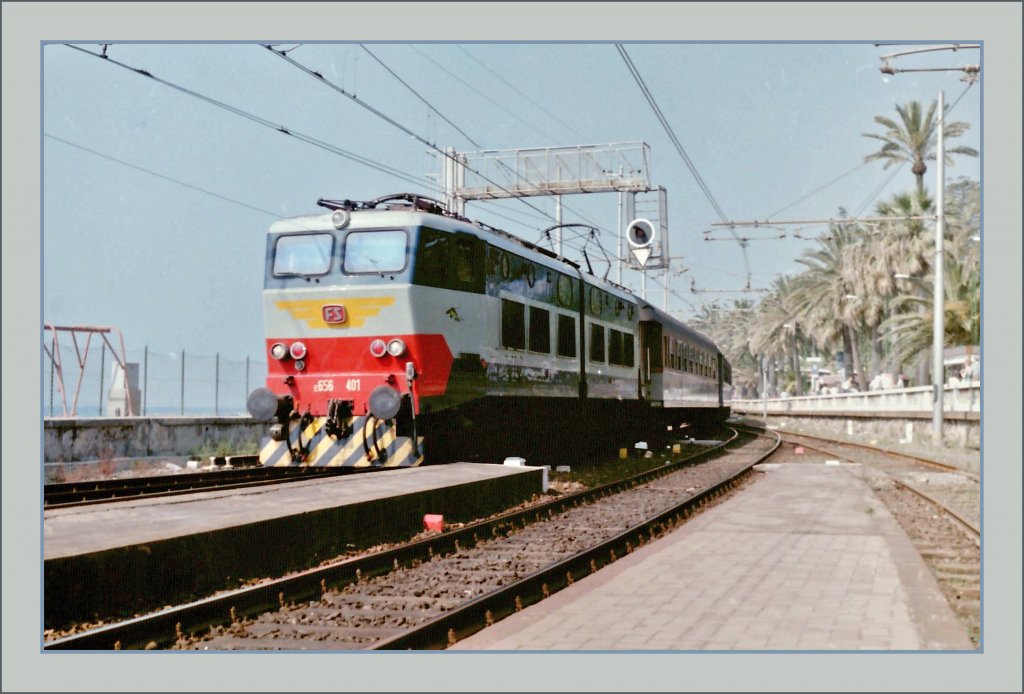 The FS  E 656 401 is arriving at the San Remo Station.
scanned negative/summer 1985