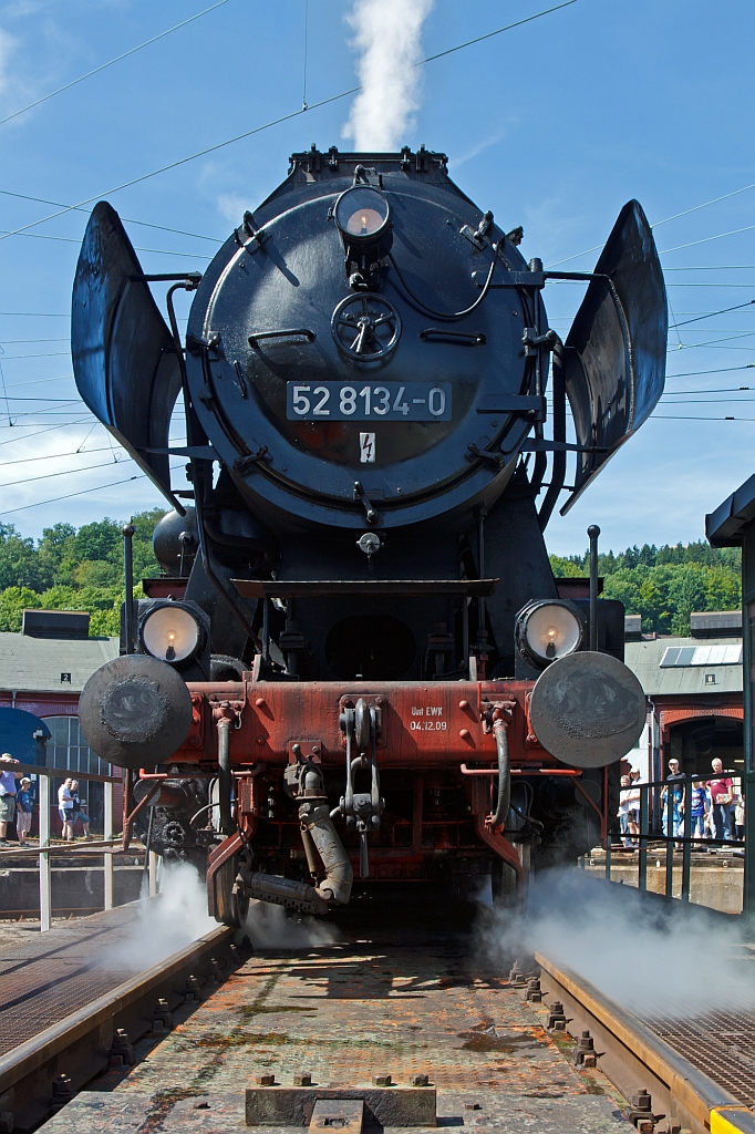 The German Steam Locomotive 52 8134-0 from the Eisenbahnfreunde Betzdorf (Railway friends Betzdorf) on 18.08.2012 in the South Westphalian Railway Museum in Siegen (Germany). She's just driven onto the rotary disc.
