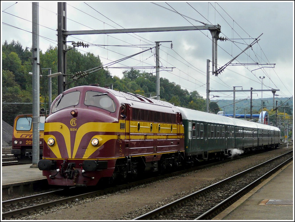 The heritage 1604 is hauling its special train out of the station of Ettelbrck on September 26th, 2010.