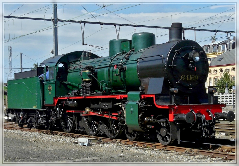 The PFT/TSP steam engine 64.169 pictured in Ciney on August 16th, 2009.