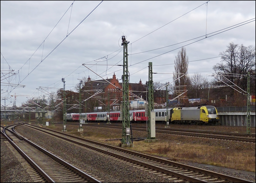 The RE4 from Ludwigsfelde to Rathenow operated by ODEG (Ostdeutsche Eisenbahn Geselschaft) is leaving the station Berlin Sdkreuz on December 29th, 2012.