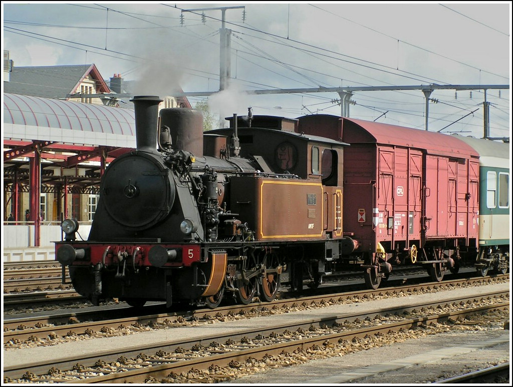 The steam engine N 5 of the heritage railway Train 1900 is running through the station of Ptange on September 19th, 2004.