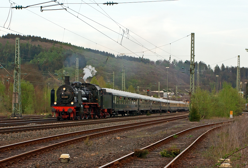The steam locomotive 38 2267 a Prussian P8 of the DGEG pulls the first special train of the Eifelbahn, on the way back from Gieen over Siegen and over the track of the Sieg (KBS 460) in the direction of Cologne. Here on 28.04.2011 in Betzdorf/Sieg.