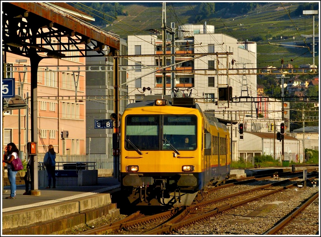 The  Train des Vignes  is entering into the station of Vevey in the early morning of May 29th, 2012.