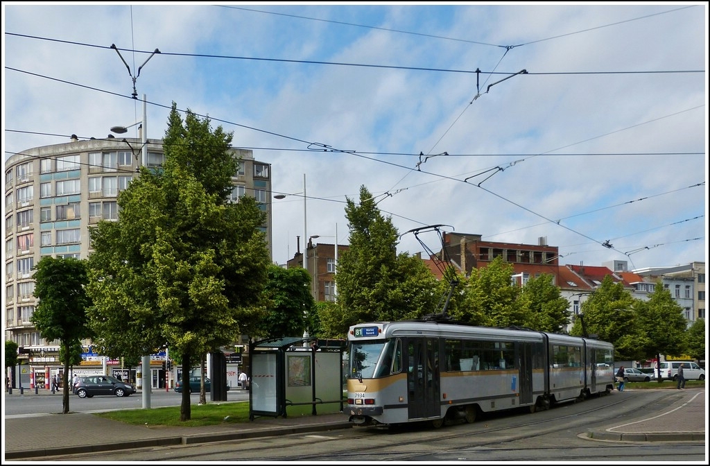 The tram N 7934 is leaving the stop Bara in Brussels on June 24th, 2012.
