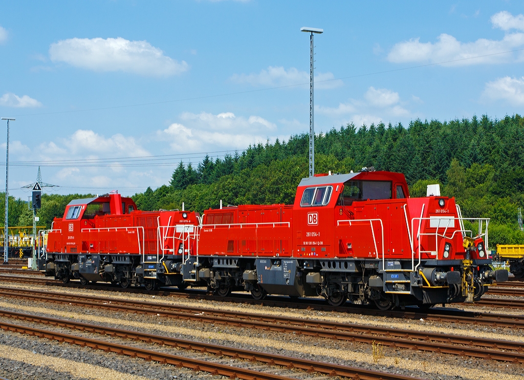 Two Shunting Locomotives Voith Gravita 10 BB, the 261 079-8 and 261 054-1 of the DB Schenker Rail Deutschland AG stands at 09.07.2013 by the station Montabaur. 

It is large and looks very powerful. The Gravita has the appearance you expect for a powerful locomotive. It is used primarily for transporting freight. It was developed especially for this. Fast and safe pulling heavy loads. Large amounts don't pose a problem. Perfect for shunting and a wide variety of other applications. Locally and wherever it's needed.

Technical Data: 
Wheel arrangement:  B'B'
Track gauge:  1.435 mm
Length over buffers: 15.700 mm
Power: 1000 kw / 1341 hp
V max.: 100 km/h
Starting tractive effort / Mass: 258 kN at 80 t
