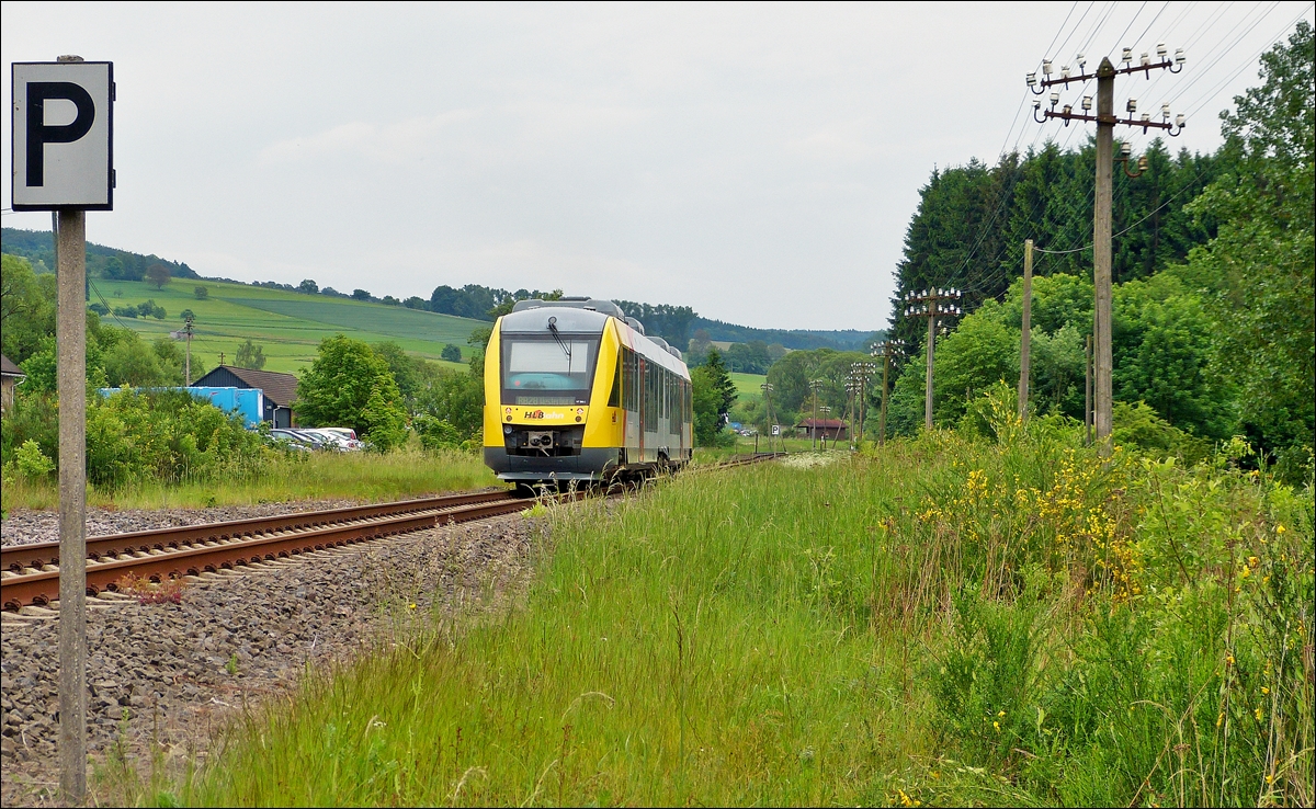 . A HLB LINT 41 is leaving the station Unnau-Korb on May 26th, 2014.