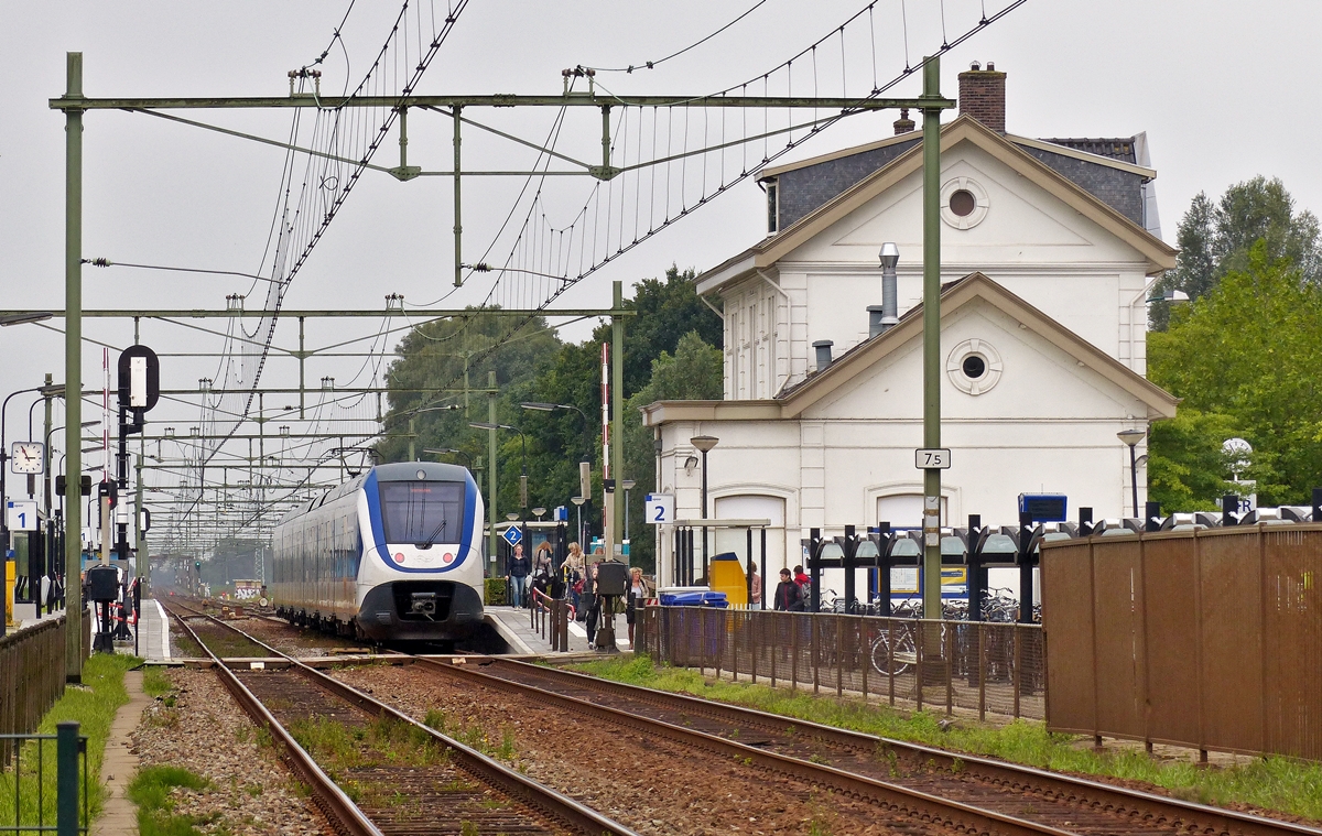 . A NS SLT Sprinter Lighttrain is waiting for passengers in Zevenbergen on September 4th, 2015.