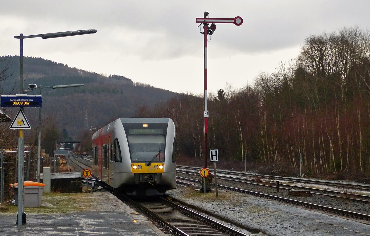 . A Stadler GTW 2/6 of the Hellertalbahn to Betzdorf/Sieg is entering into the station of Herdorf on March 2nd, 2015.