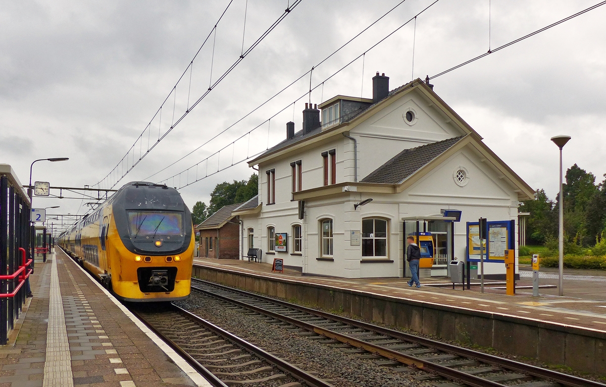 . A VIRM Regiorunner is running without stop through the station of Oudenbosch on September 4th, 2015.