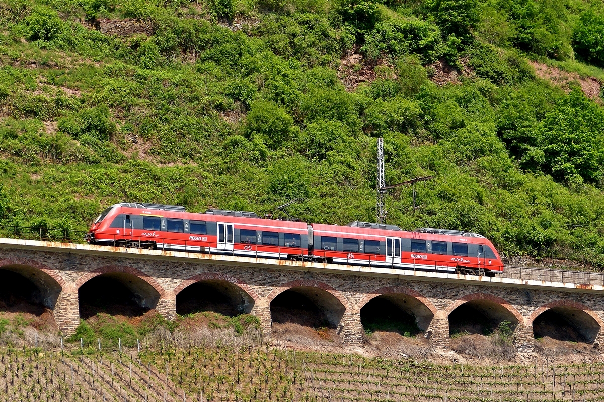 . DB Regio 442 003  Nittel  photographed on the slope viaduct near Pnderich on May 13th, 2015.
